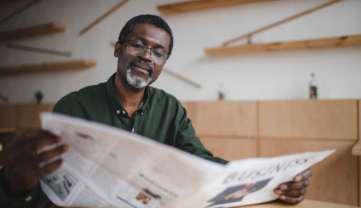 Man reading newspaper