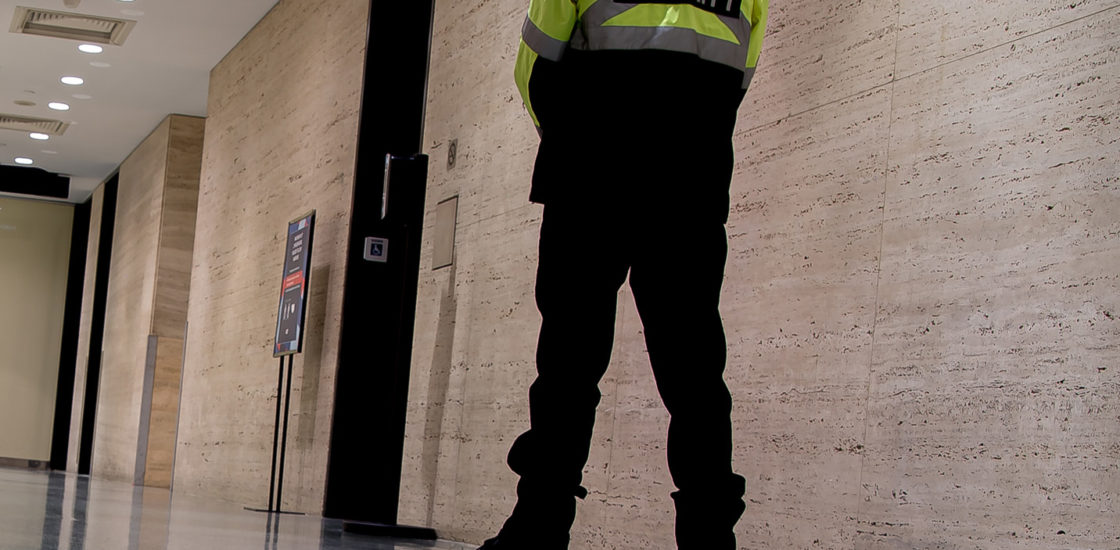 Security guard patrolling commercial building